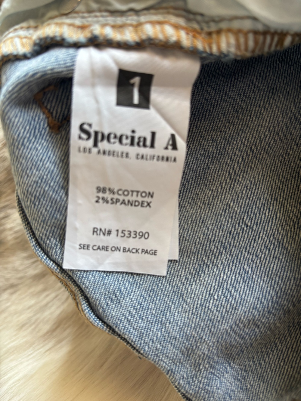 Distressed Mid-Blue Women's Skinny Jeans - Picture 4 of 5